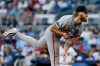 San Francisco Giants pitcher Carson Whisenhunt delivers to an Atlanta Braves batter during the first inning of a baseball game, Wednesday, June 17, 2026, in Atlanta. (AP Photo/Erik S. Lesser)