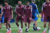Qatar's Hassan Alhaydos, right, is embraced during a training session on the eve of the team's World Cup soccer match against Canada, Wednesday, June 17, 2026, in Vancouver, British Columbia. (AP Photo/Abbie Parr)