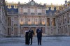 U.S. President Donald Trump is greeted by French President Emmanuel Macron and and first lady Brigitte Macron as he arrives at the Palace of Versailles, Wednesday, June 17, 2026, in Versailles, France. (AP Photo/Julia Demaree Nikhinson)