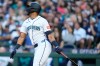 Seattle Mariners' Julio Rodríguez follows through on a double against the Baltimore Orioles during the fourth inning of a baseball game, Wednesday, June 17, 2026, in Seattle. (AP Photo/Lindsey Wasson)