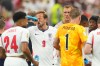 England's Harry Kane (9) cools off during a hydration break of the World Cup Group L soccer match between England and Croatia in Arlington, Texas, near Dallas, Wednesday, June 17, 2026. (AP Photo/Julio Cortez)