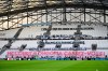 FILE -Banners protesting the club owner are placed on the stands during the French League One soccer match between Marseille and Strasbourg in Marseille, France, Feb. 14, 2026. (AP Photo/Philippe Magoni), File)
