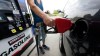 FILE - A customer readies to pump gas at this Ridgeland, Miss., Costco, Tuesday, May 24, 2022. s. (AP Photo/Rogelio V. Solis, File)