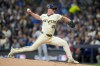FILE - Milwaukee Brewers pitcher Quinn Priester throws against the Los Angeles Dodgers during the second inning in Game 1 of baseball's National League Championship Series, Oct. 13, 2025, in Milwaukee. (AP Photo/Ashley Landis, File)