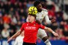 FILE - Real Madrid's Eduardo Camavinga, right, heads for the ball with Osasuna's Victor Munoz during a Spanish La Liga soccer match between Osasuna and Real Madrid in Pamplona, Spain, Feb. 21, 2026. (AP Photo/Miguel Oses, File)