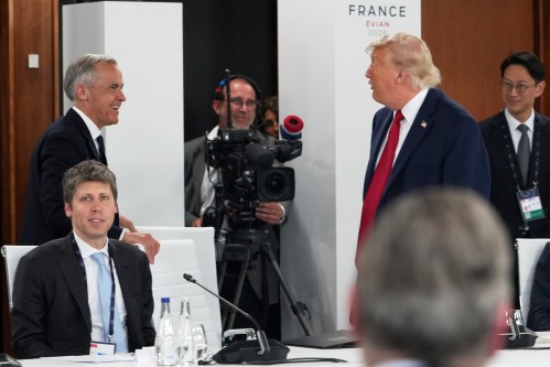 U.S. President Donald Trump talks to Prime Minister Mark Carney during the G7 summit on Wednesday, June 17, 2026 in Evian-les-Bains, France. (AP Photo/Julia Demaree Nikhinson, Pool)