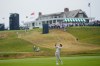 Miles Russell hits from the fairway on the first hole during the first round of the U.S. Open golf tournament at Shinnecock Hills Golf Club in Southampton, N.Y., Thursday, June 18, 2026.(AP Photo/David J. Phillip)