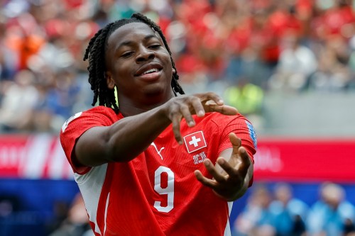 Switzerland's Johan Manzambi celebrates after scoring the opening goal against Bosnia during the World Cup Group B soccer match in Inglewood, Calif., near Los Angeles, Thursday, June 18, 2026. (Peter Klaunzer/Keystone via AP)