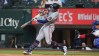 Minnesota Twins' Brooks Lee, left, hits a home run in front of Texas Rangers catcher Kyle Higashioka during the first inning of a baseball game against the Texas Rangers, Thursday, June 18, 2026, in Arlington, Texas. (AP Photo/LM Otero)