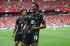 Canada's Jonathan David (10) celebrates after scoring their second goal during the World Cup Group B soccer match between Canada and Qatar in Vancouver, British Columbia, Thursday, June 18, 2026. (AP Photo/Emma Peterson)