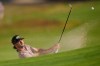 Ryder Cowan hits from the bunker on the second hole during the first round of the U.S. Open golf tournament at Shinnecock Hills Golf Club in Southampton, N.Y., Thursday, June 18, 2026.(AP Photo/David J. Phillip)