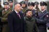 FILE - Polish President Karol Nawrocki, left, and Ukrainian President Volodymyr Zelenskyy attend an official welcome ceremony before their meeting at the Presidential Palace in Warsaw, Poland, Dec. 19, 2025. (AP Photo/Czarek Sokolowski, File)