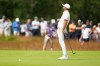 Dustin Johnson reacts after missing a putt during the second round of the U.S. Open golf tournament at Shinnecock Hills Golf Club in Southampton, N.Y., Friday, June 19, 2026.(AP Photo/Gerald Herbert)