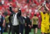 Canada head coach Jesse Marsch and goalkeeper Maxime Crepeau (16) celebrate a win over Qatar in a World Cup Group B soccer match, in Vancouver, on Thursday, June 18, 2026. THE CANADIAN PRESS/Darryl Dyck