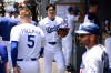 Los Angeles Dodgers starting pitcher Shohei Ohtani smiles in the dugout during the first inning of a baseball game against the Tampa Bay Rays in Los Angeles, Wednesday, June 17, 2026. (AP Photo/Kyusung Gong)