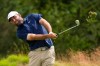 Scottie Scheffler hits his tee shot on the 11th hole during the second round of the U.S. Open golf tournament at Shinnecock Hills Golf Club in Southampton, N.Y., Friday, June 19, 2026.(AP Photo/Seth Wenig)