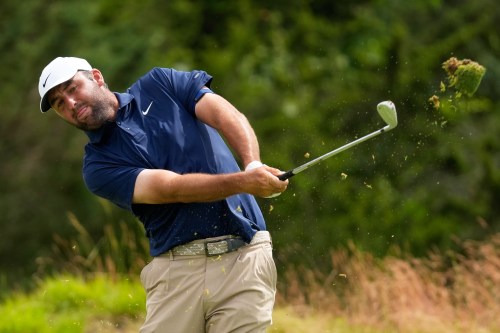 Scottie Scheffler hits his tee shot on the 11th hole during the second round of the U.S. Open golf tournament at Shinnecock Hills Golf Club in Southampton, N.Y., Friday, June 19, 2026.(AP Photo/Seth Wenig)
