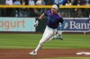 Arizona Diamondbacks' Corbin Carroll rounds secondbase after hitting a three-run triple against the Minnesota Twins in the eighth inning of a baseball game, Friday, June 19, 2026, in Phoenix. (AP Photo/Rick Scuteri)