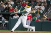 Athletics' Jonah Heim hits a home run during the ninth inning of a baseball game against the Los Angeles Angels in West Sacramento, Calif., Friday, June 19, 2026. (AP Photo/Nic Coury)