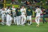 The Athletics celebrate winning a baseball game against the Los Angeles Angels in West Sacramento, Calif., Friday, June 19, 2026. (AP Photo/Nic Coury)