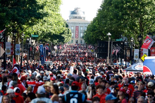 Carolina Hurricanes fans crowd onto Fayetteville Street prior to the start of the Stanley Cup Championship celebration in Raleigh, N.C., Saturday, June 20, 2026. (AP Photo/Karl DeBlaker)