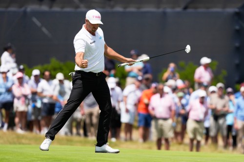 Wyndham Clark celebrates after a birdie on the 13th hole during the second round of the U.S. Open golf tournament at Shinnecock Hills Golf Club in Southampton, N.Y., Friday, June 19, 2026.(AP Photo/Seth Wenig)