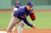 Texas Rangers pitcher Nathan Eovaldi throws during the first inning of a baseball game against the Boston Red Sox, Sunday, June 14, 2026, in Boston. (AP Photo/Mark Stockwell)
