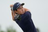 Dylan Wu watches his tee shot on the 13th hole during the first round of the U.S. Open golf tournament at Shinnecock Hills Golf Club in Southampton, N.Y., Thursday, June 18, 2026.(AP Photo/George Walker IV)