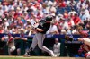 Miami Marlins' Liam Hicks hits a run scoring single against Philadelphia Phillies' Andrew Painter during the second inning of a baseball game Wednesday, June 17, 2026, in Philadelphia. (AP Photo/Matt Slocum)