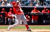 Cincinnati Reds' Sal Stewart hits an RBI double during the third inning of a baseball game against the New York Yankees, Saturday, June 20, 2026, in New York. (AP Photo/Noah K. Murray)