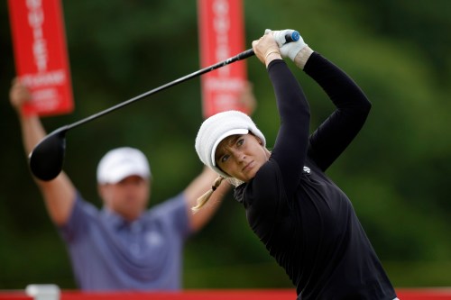 Cassie Porter, of Australia, watches her tee shot on the ninth hole during the first round of the Meijer LPGA Classic golf tournament, Thursday, June 18, 2026, in Belmont, Mich. (AP Photo/Al Goldis)