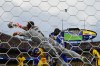 Curaçao goalkeeper Eloy Room (1) makes a save during the World Cup Group E soccer match between Ecuador and Curacao in Kansas City, Mo., Saturday, June 20, 2026. (AP Photo/Ed Zurga)