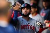 Boston Red Sox Wilyer Abreu celebrates after scoring on a wild pitch by Seattle Mariners pitcher José A. Ferrer in the sixth inning of a baseball game Saturday, June 20, 2026, in Seattle. (AP Photo/Kevin Ng)