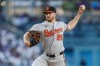 Baltimore Orioles starting pitcher Trevor Rogers (28) throws during the second inning of a baseball game against the Los Angeles Dodgers, Saturday, June 20, 2026, in Los Angeles. (AP Photo/Caroline Brehman)