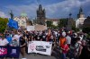 Thousands of people march to protest against a government plan to change public broadcaster funding in Prague, Czech Republic, Sunday, May 24, 2026. (AP Photo/Petr David Josek)