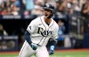 Tampa Bay Rays' Jonny DeLuca celebrates after his two-run home run as he rounds the bases during the seventh inning of a baseball game against the Washington Nationals, Sunday, June 21, 2026, in St. Petersburg, Fla. (AP Photo/Jason Behnken)
