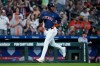 Houston Astros' Yordan Alvarez runs home to score on a hit by Isaac Paredes during the fourth inning of a baseball game against the Cleveland Guardians, Sunday, June 21, 2026, in Houston. (AP Photo/Kevin M. Cox)