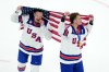 FILE — United States' Brady Tkachuk (7) and Matthew Tkachuk (19) celebrate after the United States' win over Canada in the men's ice hockey gold medal game at the 2026 Winter Olympics in Milan, Italy, Feb. 22, 2026. (AP Photo/Carolyn Kaster, File)