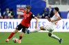 Austria's Stefan Posch (5) challenges for the ball with Jordan's Mohannad Abutaha (20) during the World Cup Group J soccer match between Austria and Jordan in Santa Clara, Calif., near San Francisco, Tuesday, June 16, 2026. (AP Photo/Eakin Howard)
