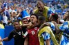 Cape Verde's Kevin Pina, center, celebrates with teammates after scoring the opening goal during the World Cup Group H soccer match between Uruguay and Cape Verde in Miami Gardens, Fla., Sunday, June 21, 2026. (AP Photo/Lynne Sladky)