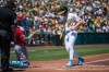 Athletics' Zack Gelof (20) scores during the first inning of a baseball game against the Los Angeles Angels in West Sacramento, Calif., Sunday, June 21, 2026. (AP Photo/Nic Coury)