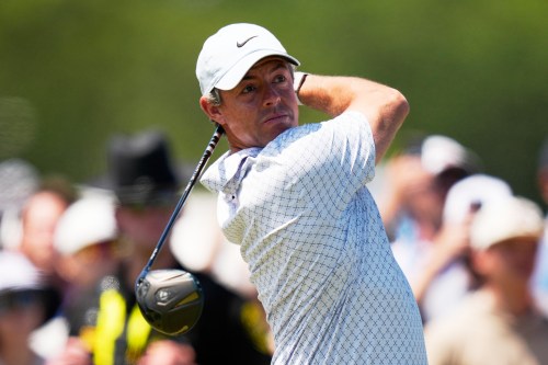 Rory McIlroy, of Northern Ireland, watches his tee shot on the ninth hole during the final round of the U.S. Open golf tournament at Shinnecock Hills Golf Club in Southampton, N.Y., Sunday, June 21, 2026. (AP Photo/Seth Wenig)