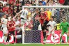 New Zealand's Finn Surman (16) scores the opening goal during the World Cup Group G soccer match between New Zealand and Egypt in Vancouver, British Columbia, Sunday, June 21, 2026. (AP Photo/Abbie Parr)