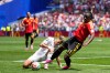 Belgium's Jeremy Doku, front, and Egypt's Emam Ashour fight for the ball during the World Cup Group G soccer match in Seattle, Monday, June 15, 2026. (AP Photo/Lindsey Wasson)