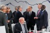 Prime Minister Mark Carney, centre, speaks with British Prime Minister Keir Starmer, centre left, during a working session at the G7 summit in Evian-les-Bains, France on Wednesday, June 17, 2026. (AP Photo/Thibault Camus)