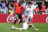 Belgium's Jeremy Doku, top, and Egypt's Marawan Attia battle for the ball during the World Cup Group G soccer match in Seattle, Monday, June 15, 2026. (AP Photo/Lindsey Wasson)