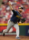 Milwaukee Brewers pitcher Brandon Woodruff throws during the first inning of a baseball against Cincinnati Reds in Cincinnati, Monday, June 22, 2026. (AP Photo/Carolyn Kaster)