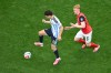 Argentina's Julian Alvarez, left, controls the ball past Austria's Nicolas Seiwald during the World Cup Group J soccer match between Argentina and Austria in Arlington, Texas, near Dallas, Monday, June 22, 2026. (AP Photo/Jessica Tobias)