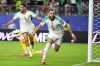 Algeria's Amine Gouiri, front, celebrates after scoring his side's second goal against Jordan during the World Cup Group J soccer match in Santa Clara, Calif., near San Francisco, Monday, June 22, 2026. (AP Photo/Eakin Howard)