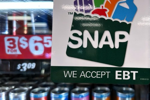 FILE - SNAP EBT information sign is displayed at a gas station in Riverwoods, Ill., Nov. 1, 2025. (AP Photo/Nam Y. Huh, File)
